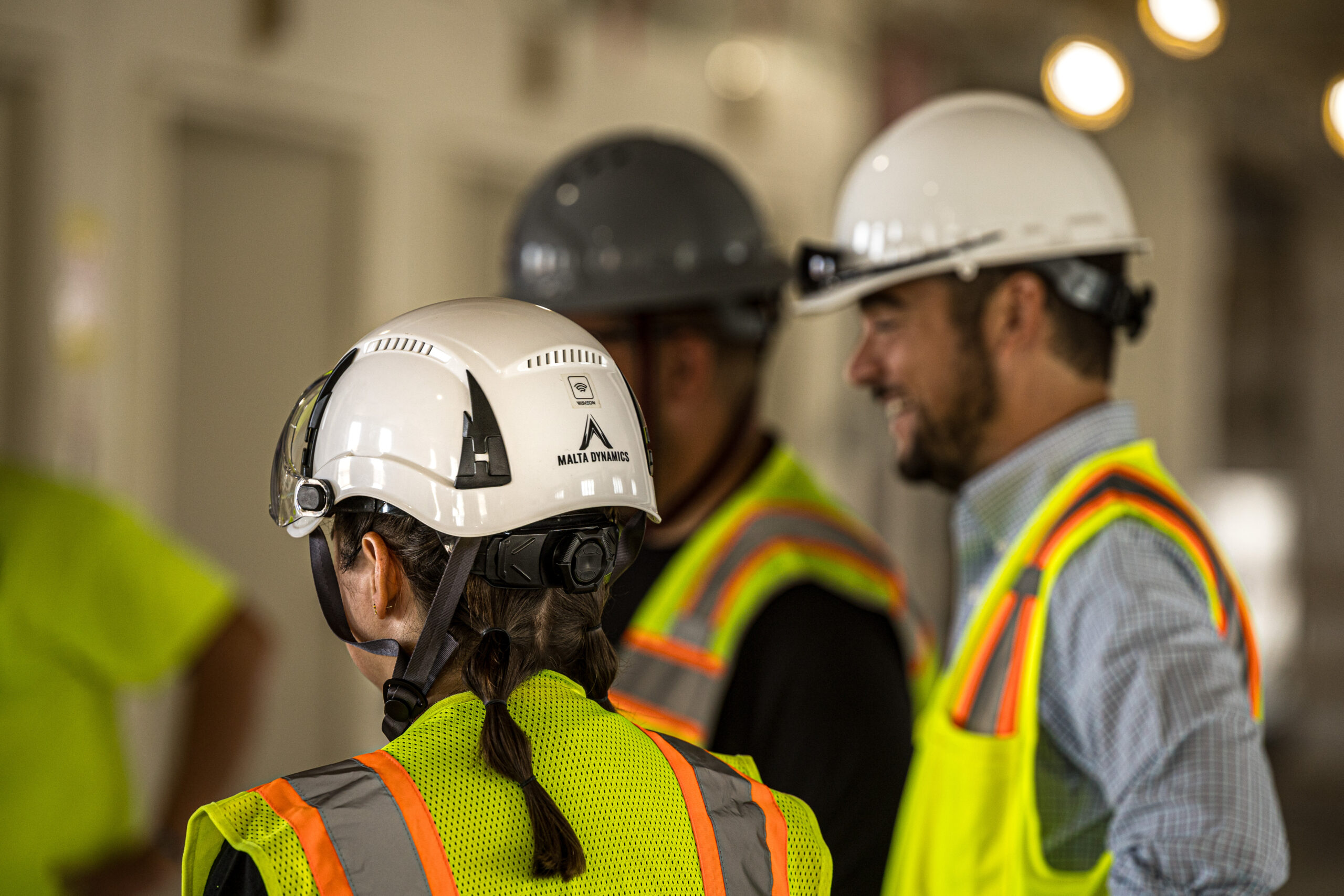 female and male construction workers